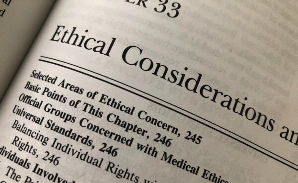 Open textbook showing a chapter titled Ethical Considerations with a table of contents listing topics like medical ethics, individual rights, and universal standards.