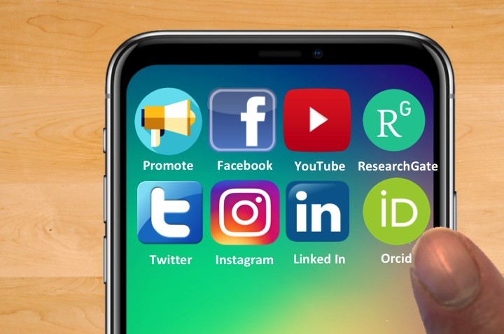 A finger points to the Orcid app icon on a smartphone screen displaying various academic and social media applications including ResearchGate, LinkedIn, Twitter, and Instagram.