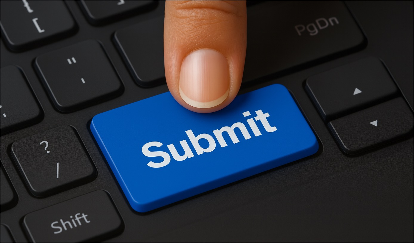 Close-up of a finger pressing a blue keyboard key labeled “Submit,” symbolising final manuscript submission or completing an online process | Niche
